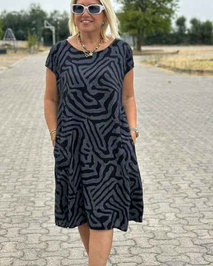 Nelia™ – Summer Dress with Round Neckline and Beautiful Print